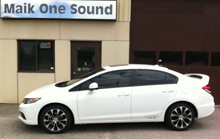 White 2013 Honda Civic SI with premium dark window tint